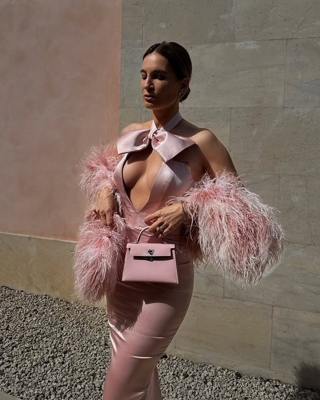 Lena Terlutter - Pink Halter Gown with Bow and Feather Sleeves