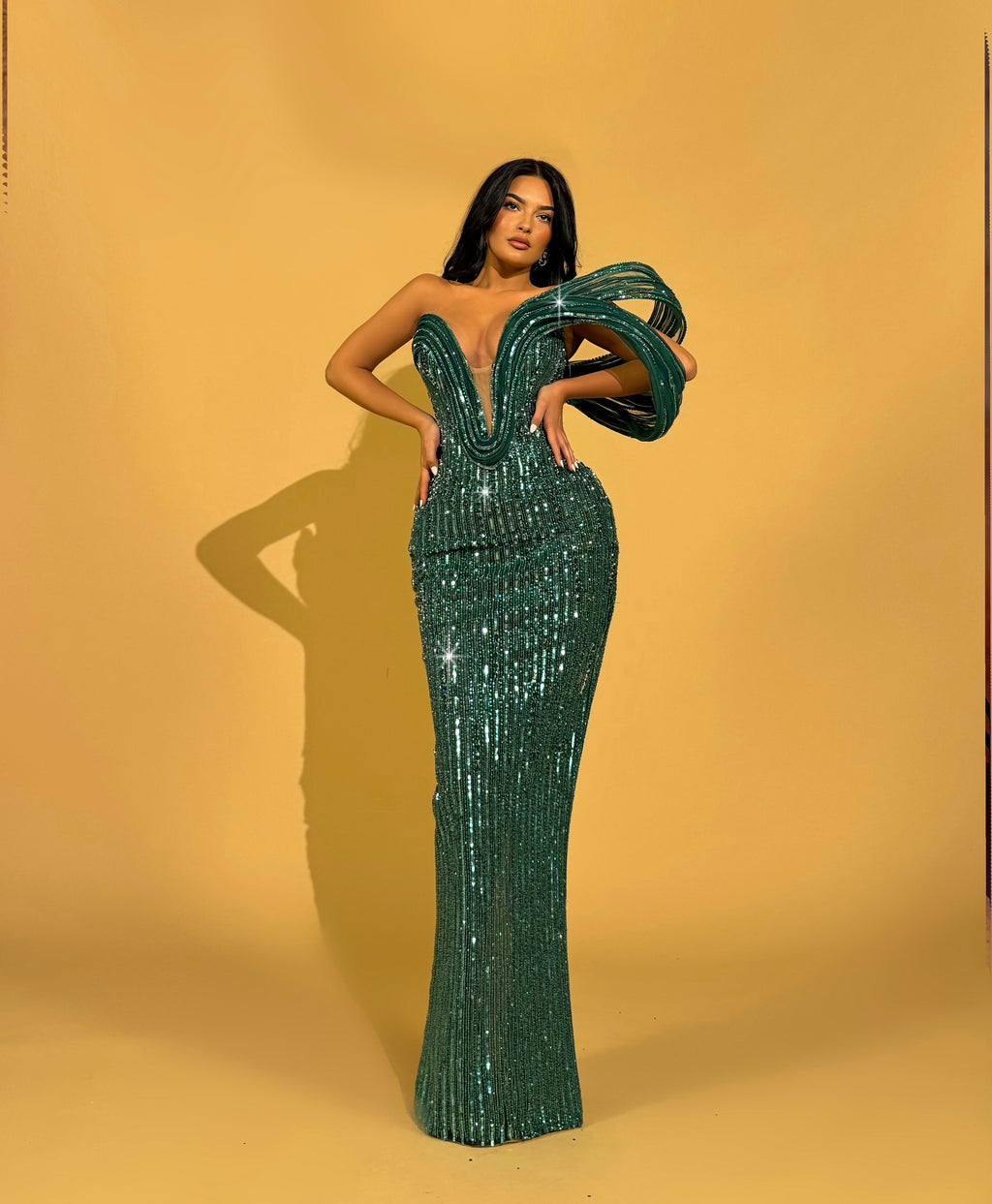 Emerald Green Sequin Gown with Sculpted Shoulder Detail