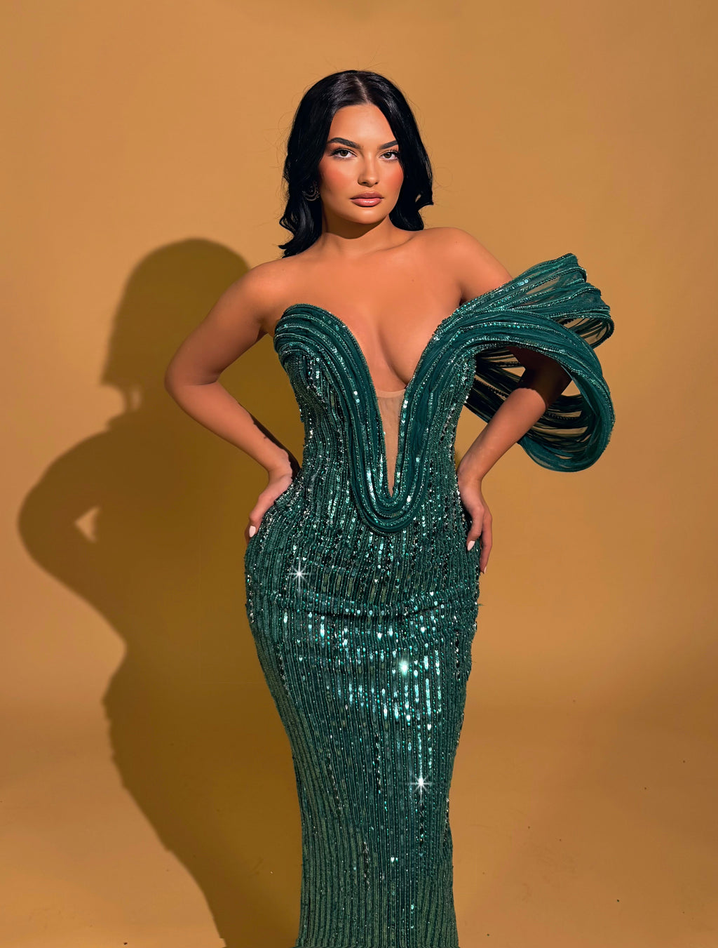 Emerald Green Sequin Gown with Sculpted Shoulder Detail