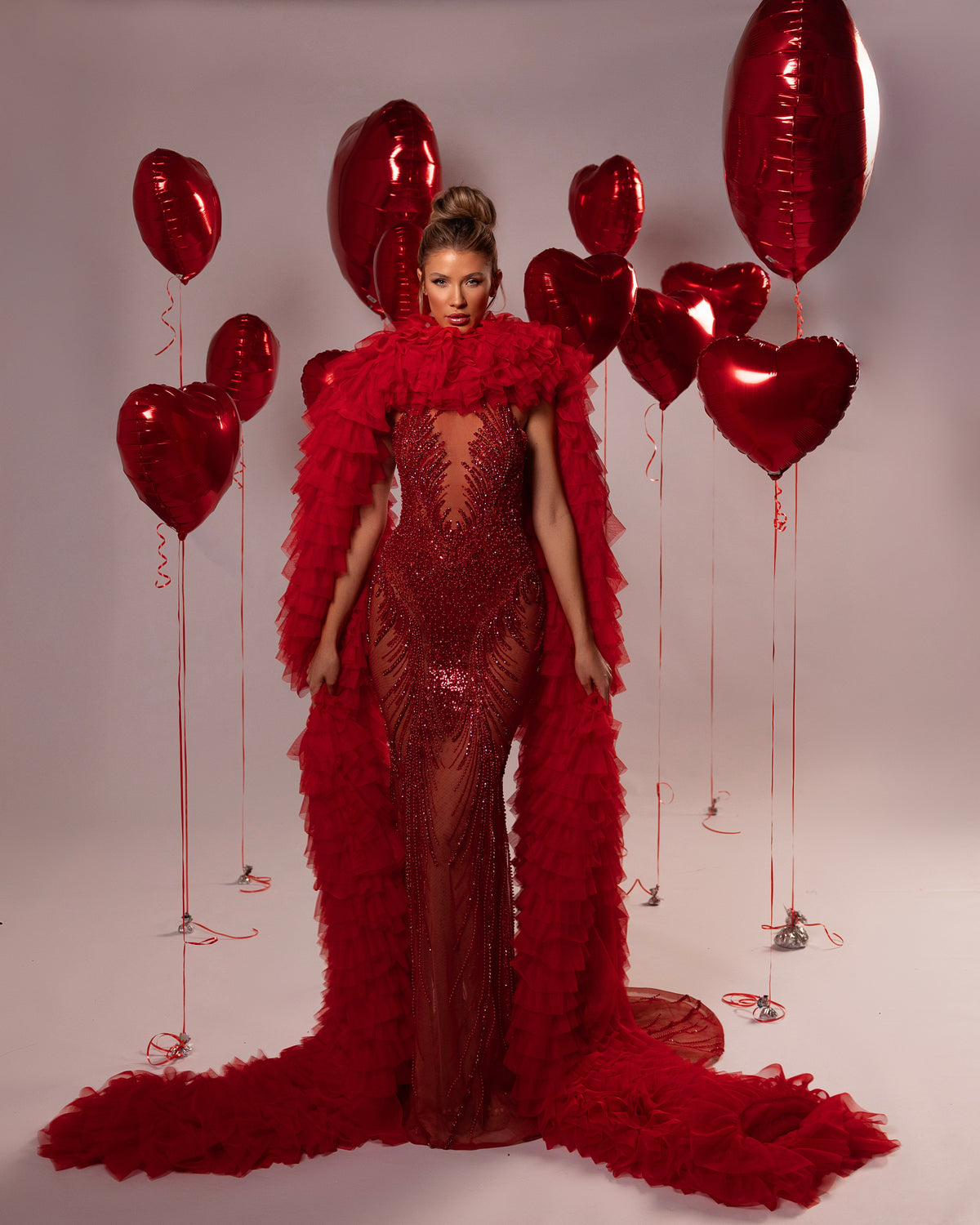 Long Beaded Ruffled Cape Gown