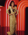 SIDE SLIT GOLD SHIMMERING DRESS WITH METALLIC GOLD CHEST DETAIL