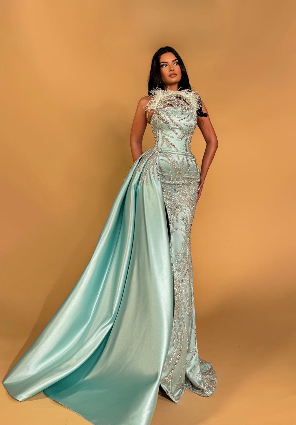 Aqua Blue Beaded Gown with Feather Neckline and Draped Overskirt