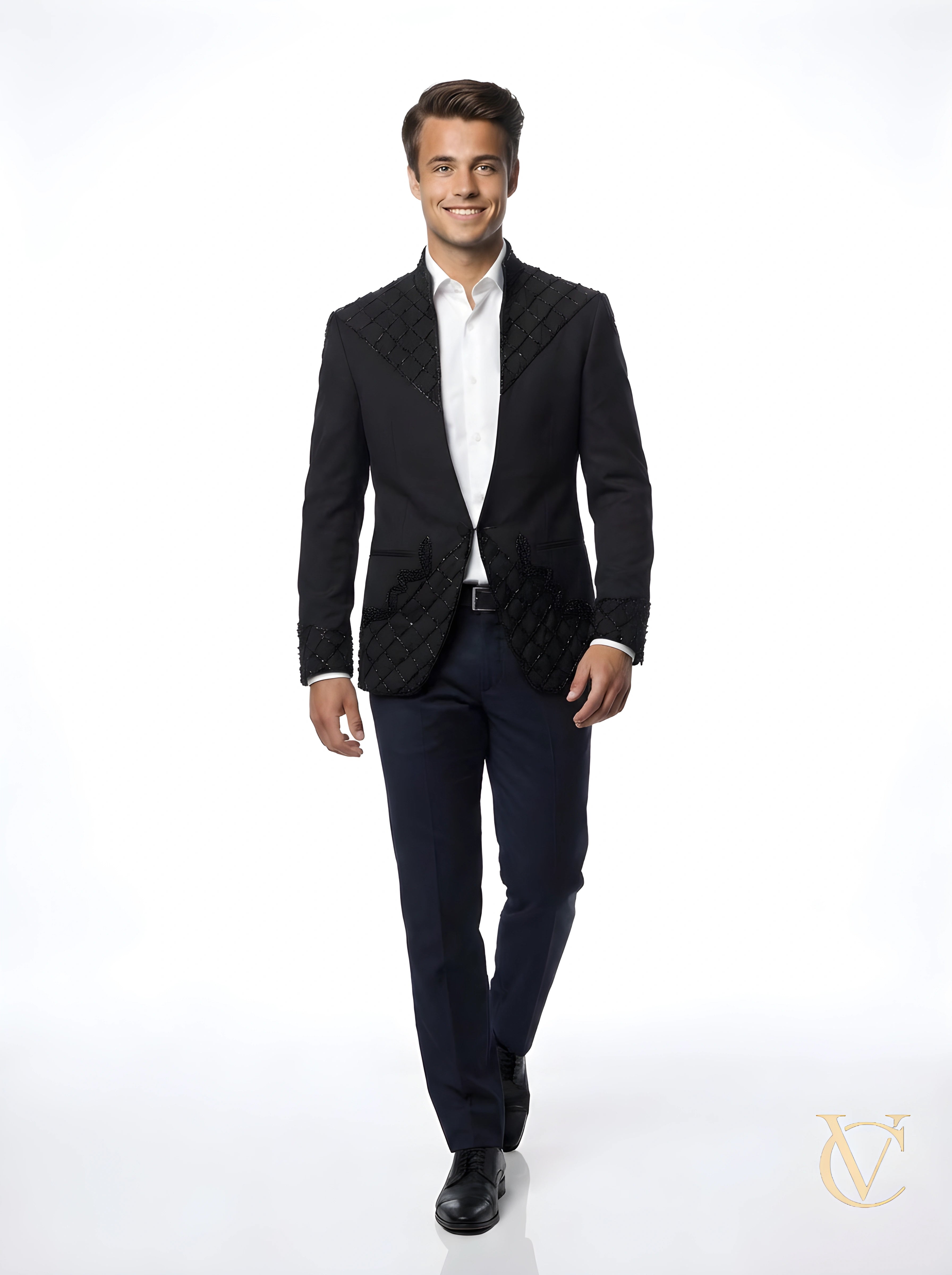 A confident man wearing the 2-Piece Suit - Black | Vellure Couture, featuring a tailored jacket with detailed embellishments and classic black trousers, styled with a white shirt.