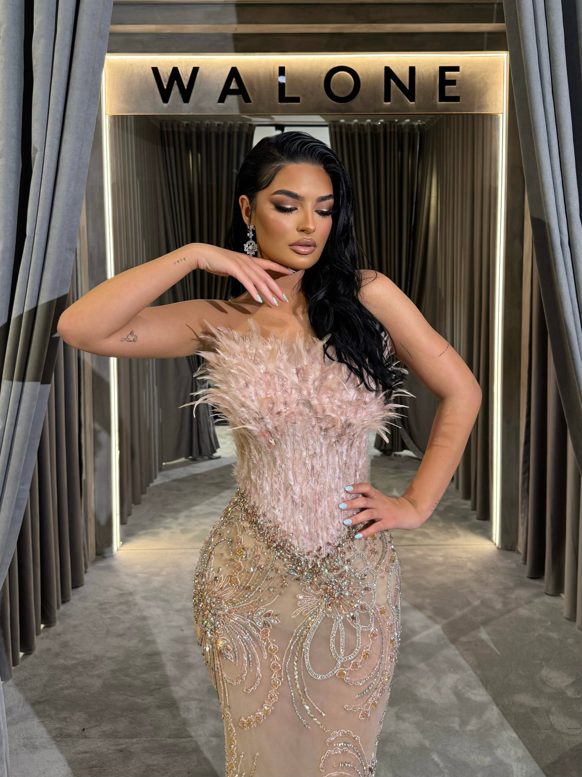 Nude Feather Embellished Crystal Gown