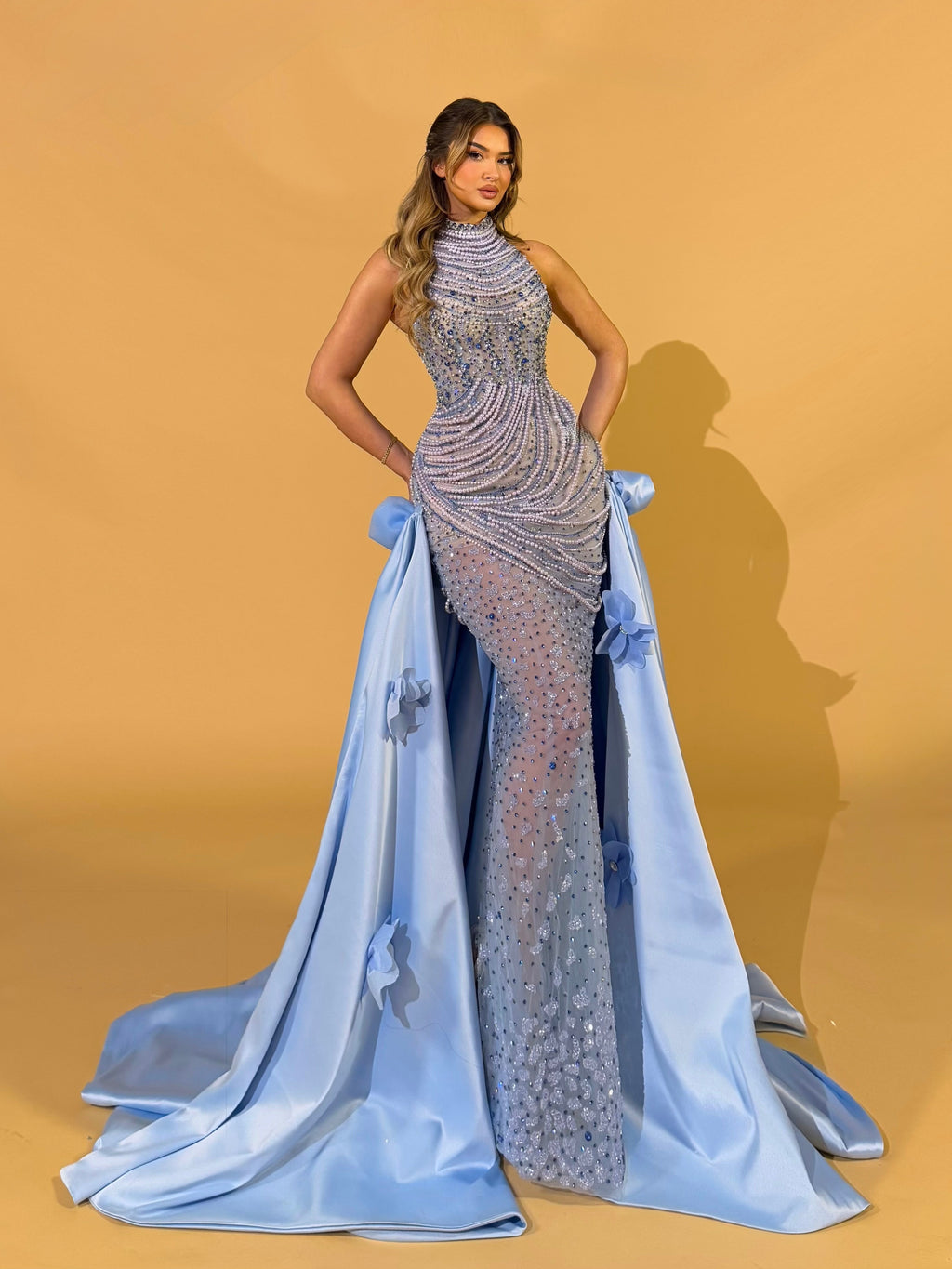 High Neck Sparkling Blue Gown with Draped Beading and Floral Train