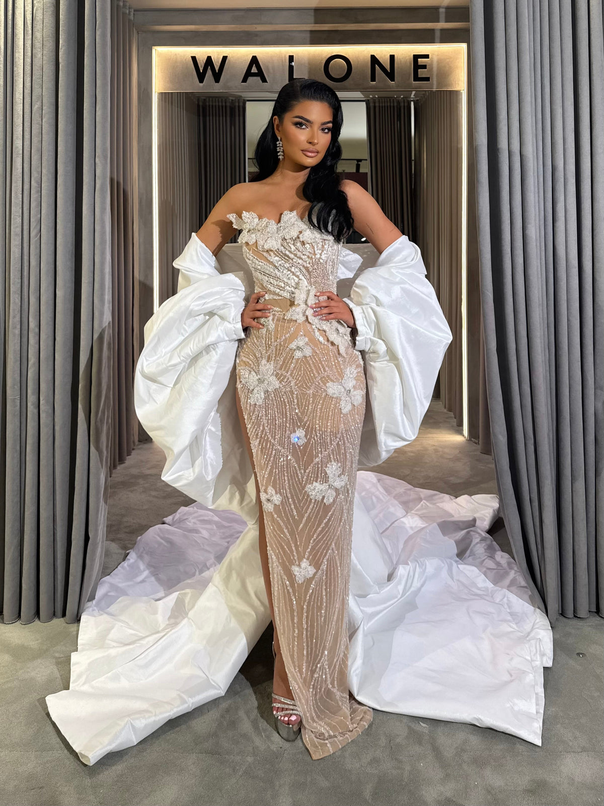 Long dress with 3D floral appliqués and sheer crystal detailing