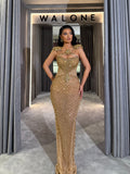 Long dress with golden crystal lattice and sculpted neckline