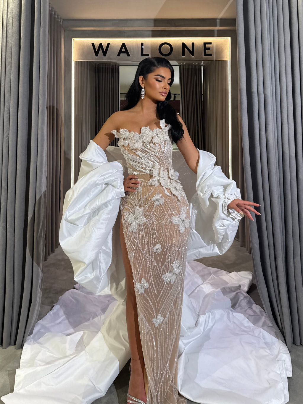 Long dress with 3D floral appliqués and sheer crystal detailing