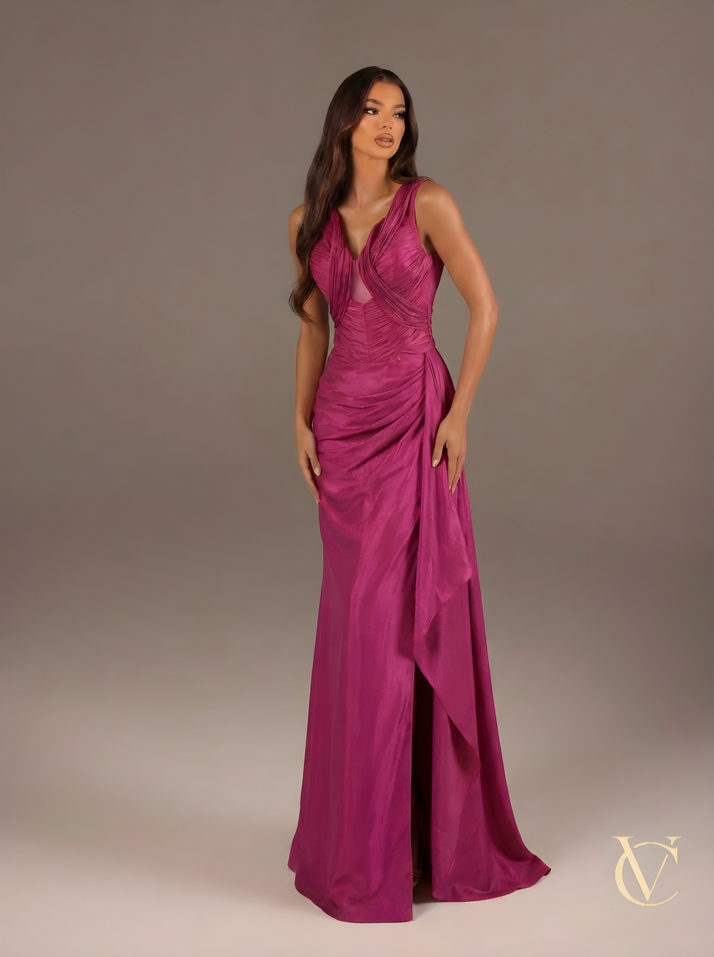 Woman wearing the Blush Satin Evening Gown | Vellure Couture — luxury couture evening gown in blush pink satin, UK boutique
