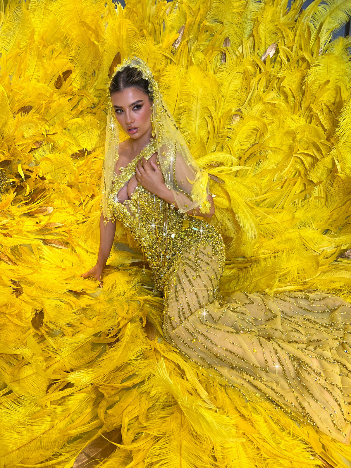 Khalia with feathered train