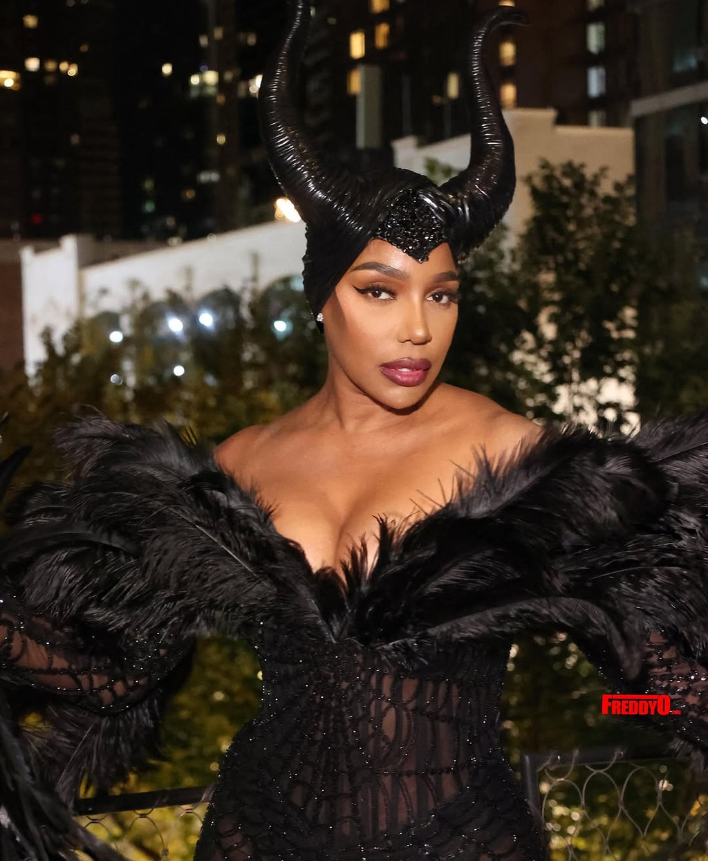 NENE LEAKES - Black feathered gown