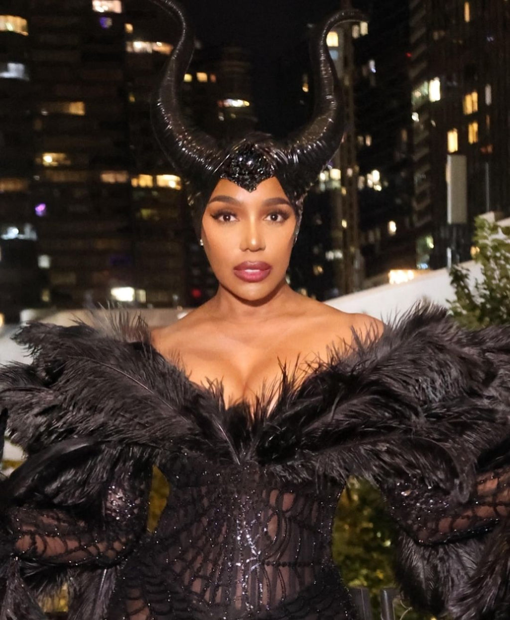 NENE LEAKES - Black feathered gown